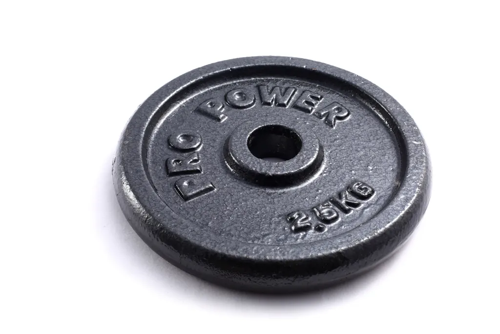 Discos de peso libre para barra en la zona de musculación